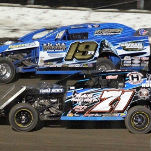 Racing next to Philip Houston at the RPM Speedway in Crandall, Texas, on Friday, April 19, 2013.